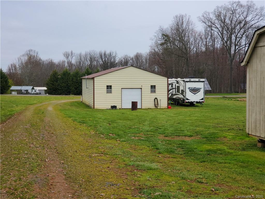 340 Weaver Road Salisbury, NC 28147 - Photo 2 of 23 a view of a house with a yard and sitting area