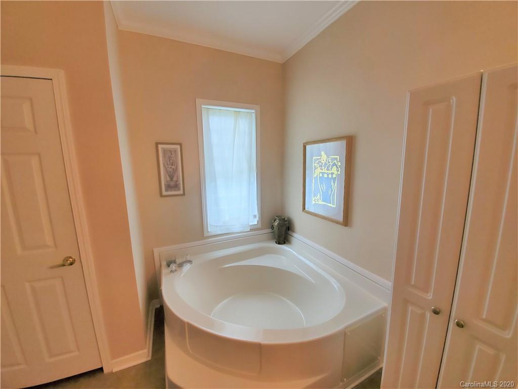 340 Weaver Road Salisbury, NC 28147 - Photo 11 of 23 a bathroom with a sink and a mirror