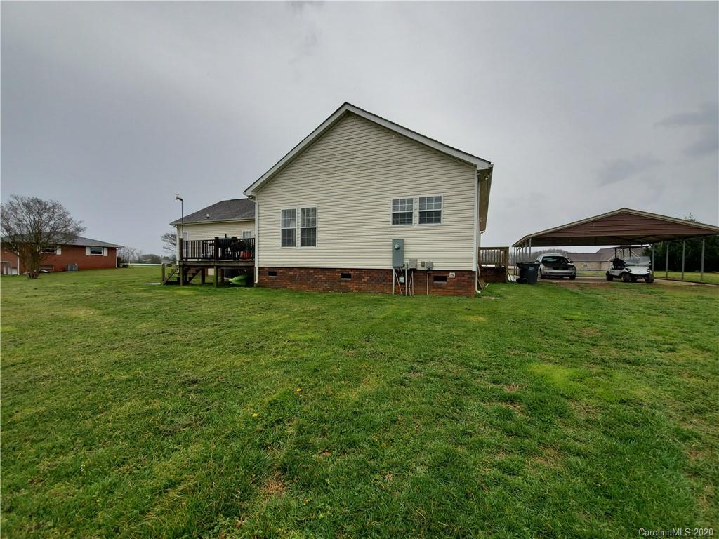 340 Weaver Road Salisbury, NC 28147 - Photo 3 of 23 a view of a house with a yard and sitting area