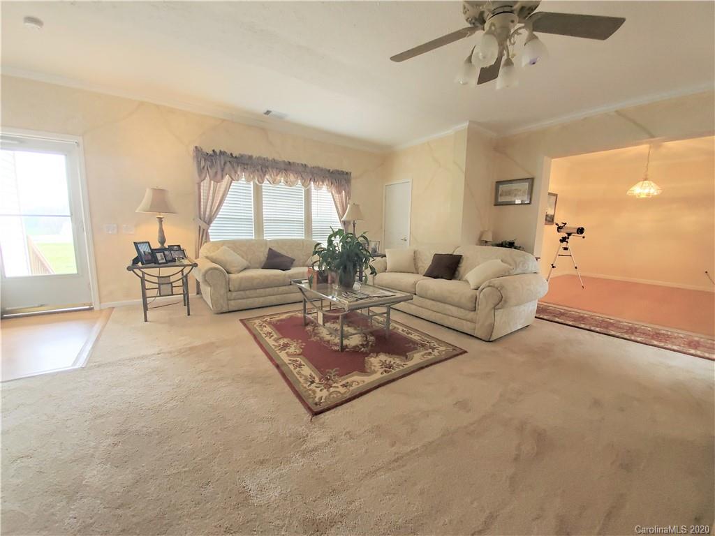 340 Weaver Road Salisbury, NC 28147 - Photo 23 of 23 a living room with furniture and a large window