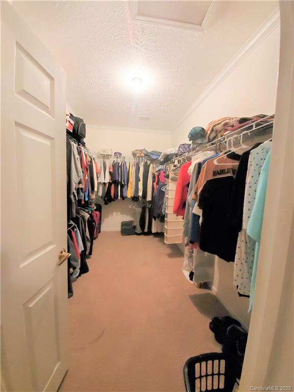 340 Weaver Road Salisbury, NC 28147 - Photo 7 of 23 a view of walk in closet with clothes