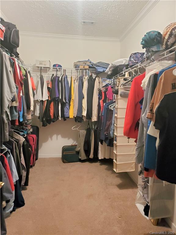 340 Weaver Road Salisbury, NC 28147 - Photo 8 of 23 a view of walk in closet with clothes