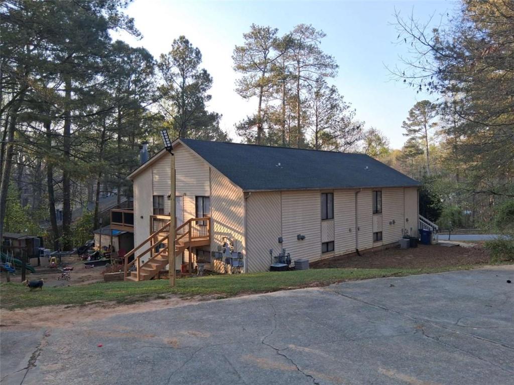 5360 Century Trace Norcross, GA 30093 - Photo 3 of 5 a view of a house with a yard and wooden fence