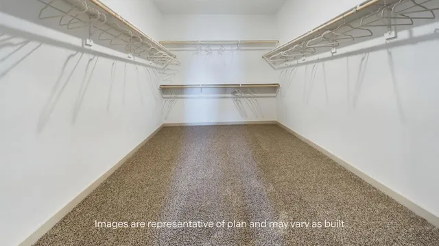 a work room with furniture and a table