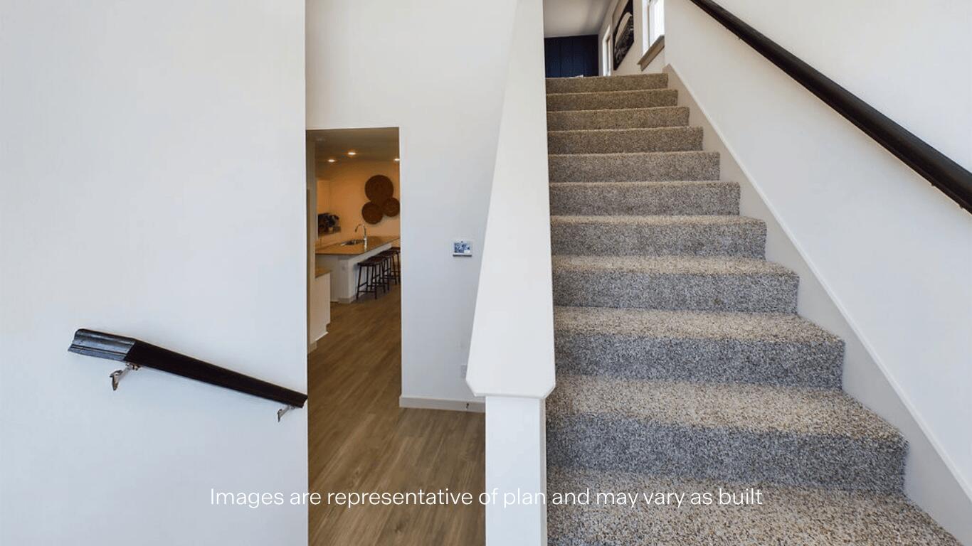 7450 9th Street Lubbock, TX 79416 - Photo 17 of 23 a view of staircase with white walls