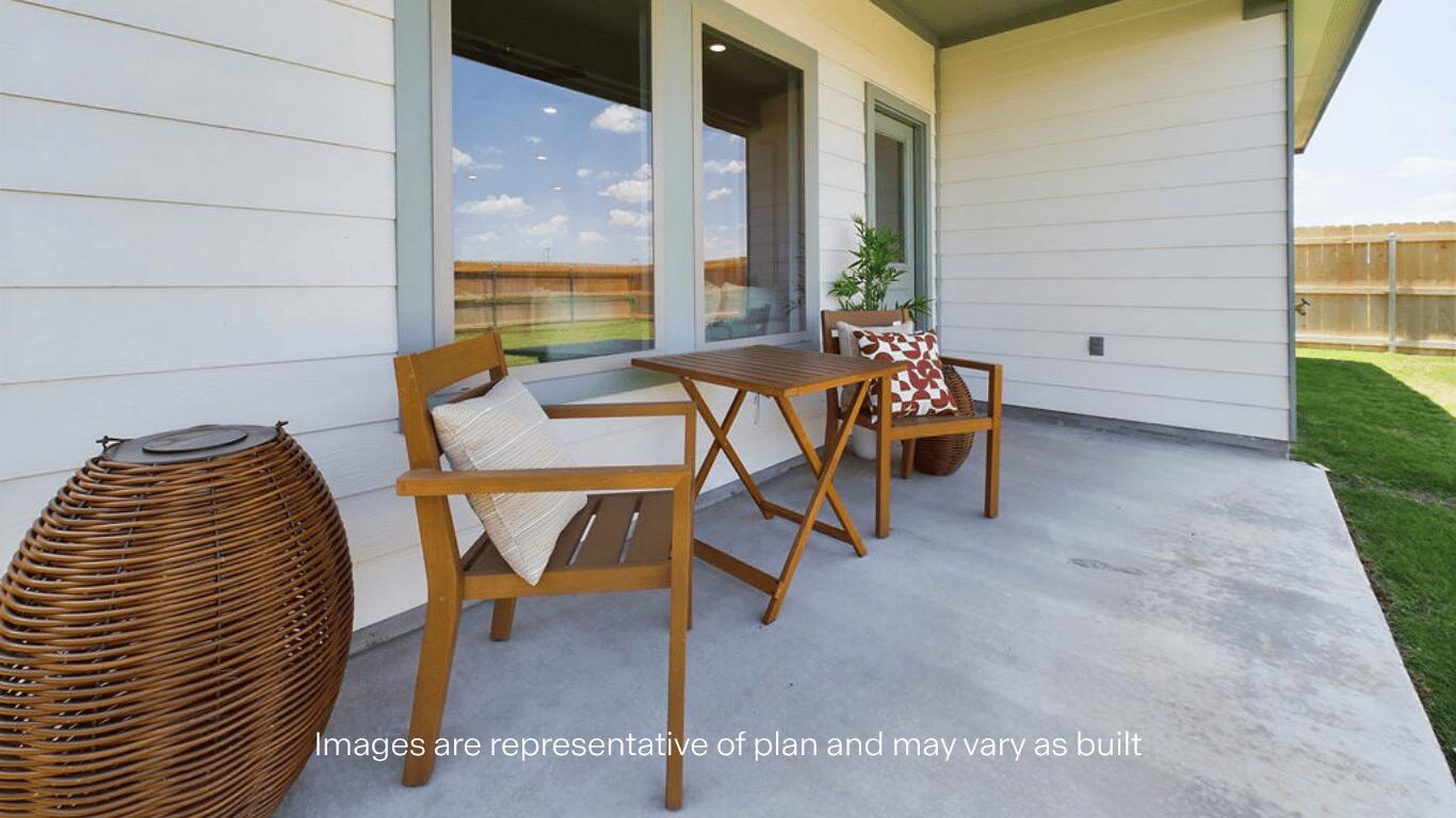 7450 9th Street Lubbock, TX 79416 - Photo 23 of 23 a balcony with chairs and table
