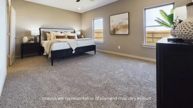 a bed room with a bed and a window