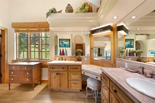 a view of entryway with hall and wooden floor