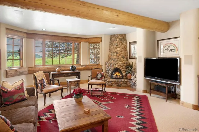 a view of a hallway with seating area