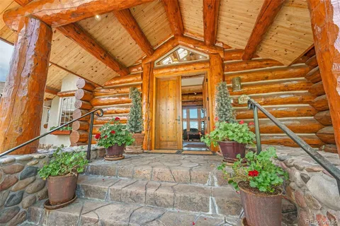 a view of a porch with seating space