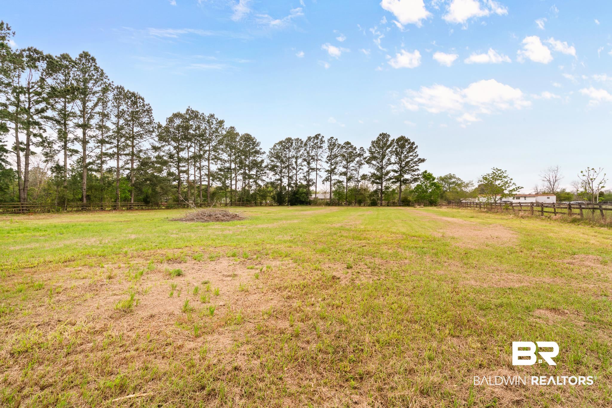 12645 Breman Road Elberta, AL 36530 - Photo 6 of 44 View of yard featuring fence and a rural view