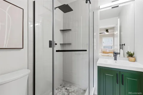 a bathroom with a sink and mirror