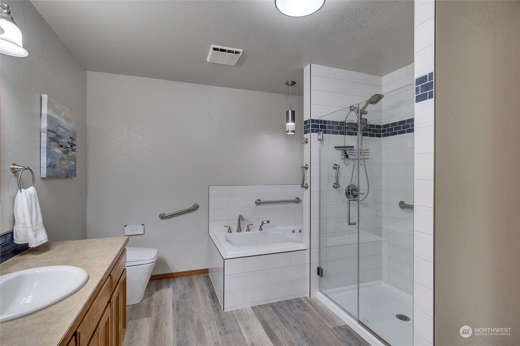 801 Main Street Sultan, WA 98294 - Photo 16 of 40 a bathroom with a sink toilet and shower