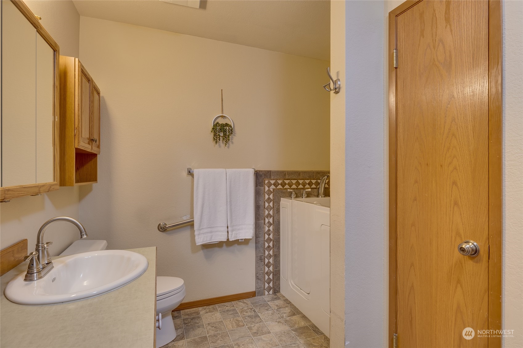801 Main Street Sultan, WA 98294 - Photo 20 of 40 a bathroom with a sink a toilet and shower