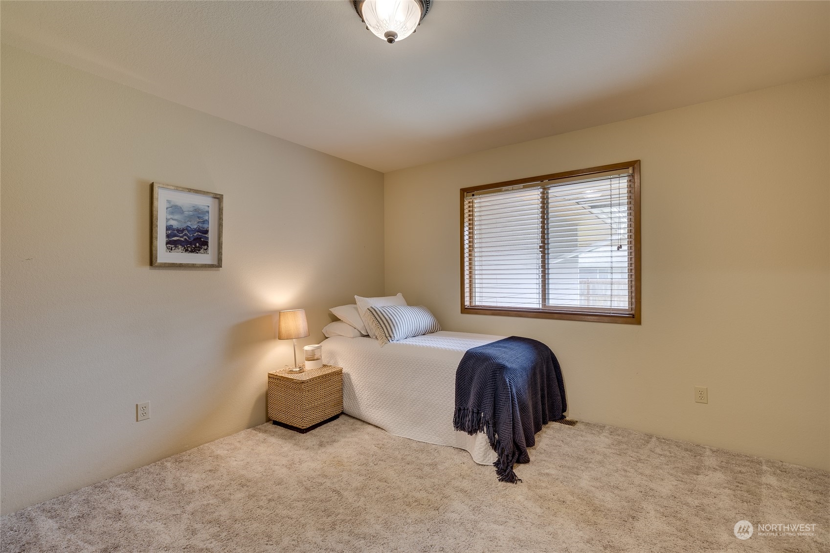 801 Main Street Sultan, WA 98294 - Photo 22 of 40 a bedroom with bed and a window