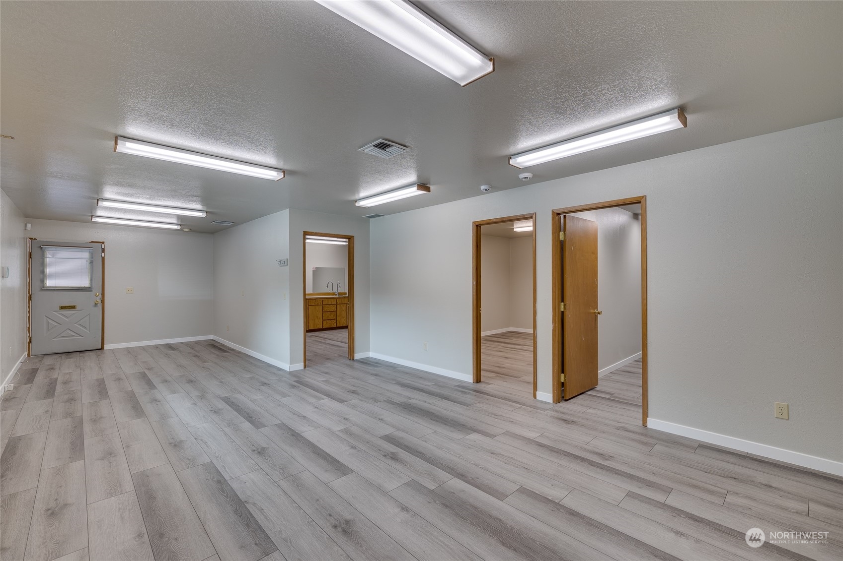 801 Main Street Sultan, WA 98294 - Photo 26 of 40 a view of empty room with wooden floor