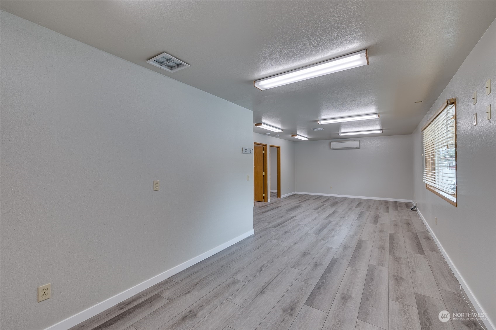 801 Main Street Sultan, WA 98294 - Photo 27 of 40 a view of empty room with wooden floor