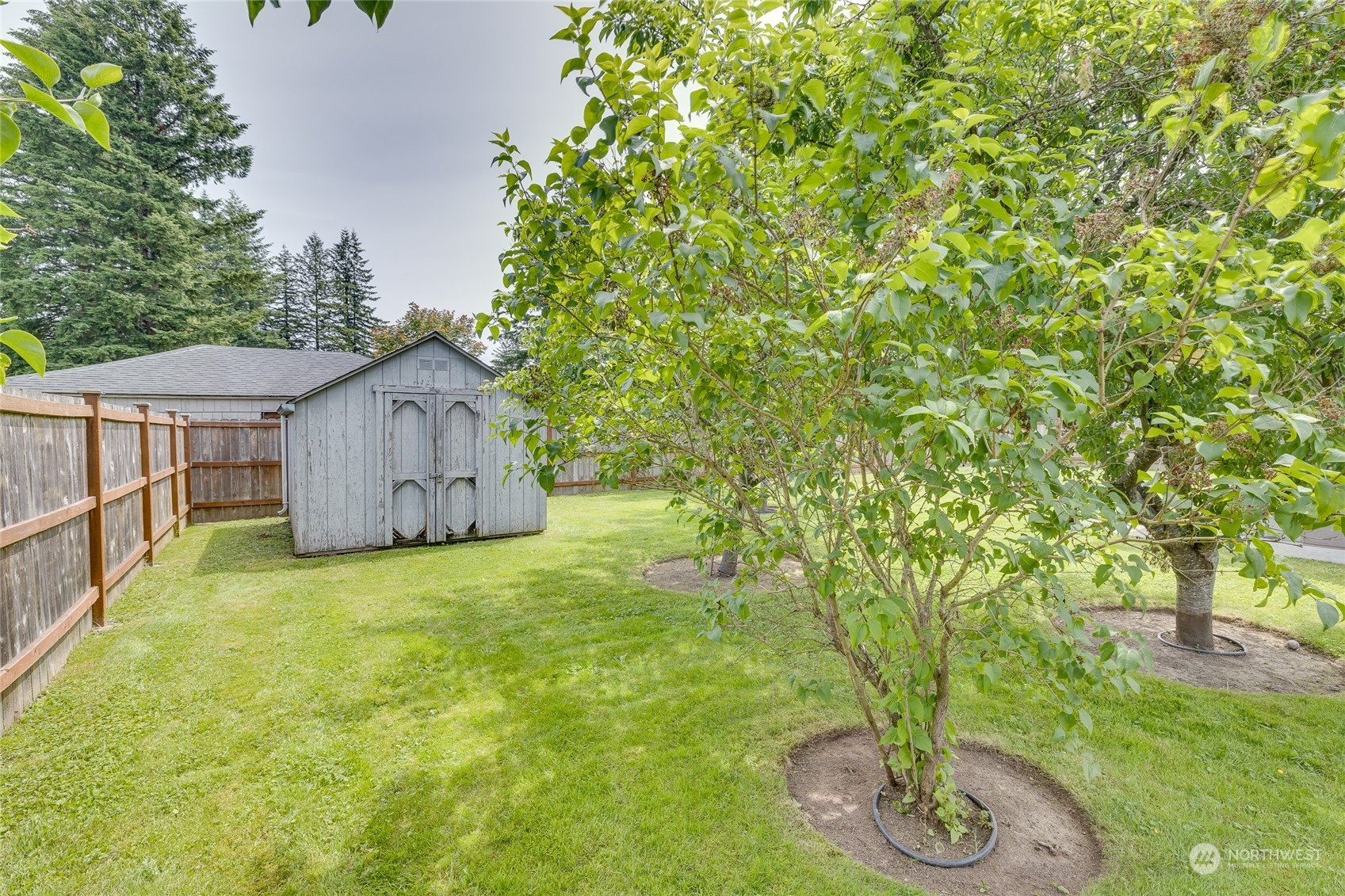 801 Main Street Sultan, WA 98294 - Photo 33 of 40 a house view with a garden space