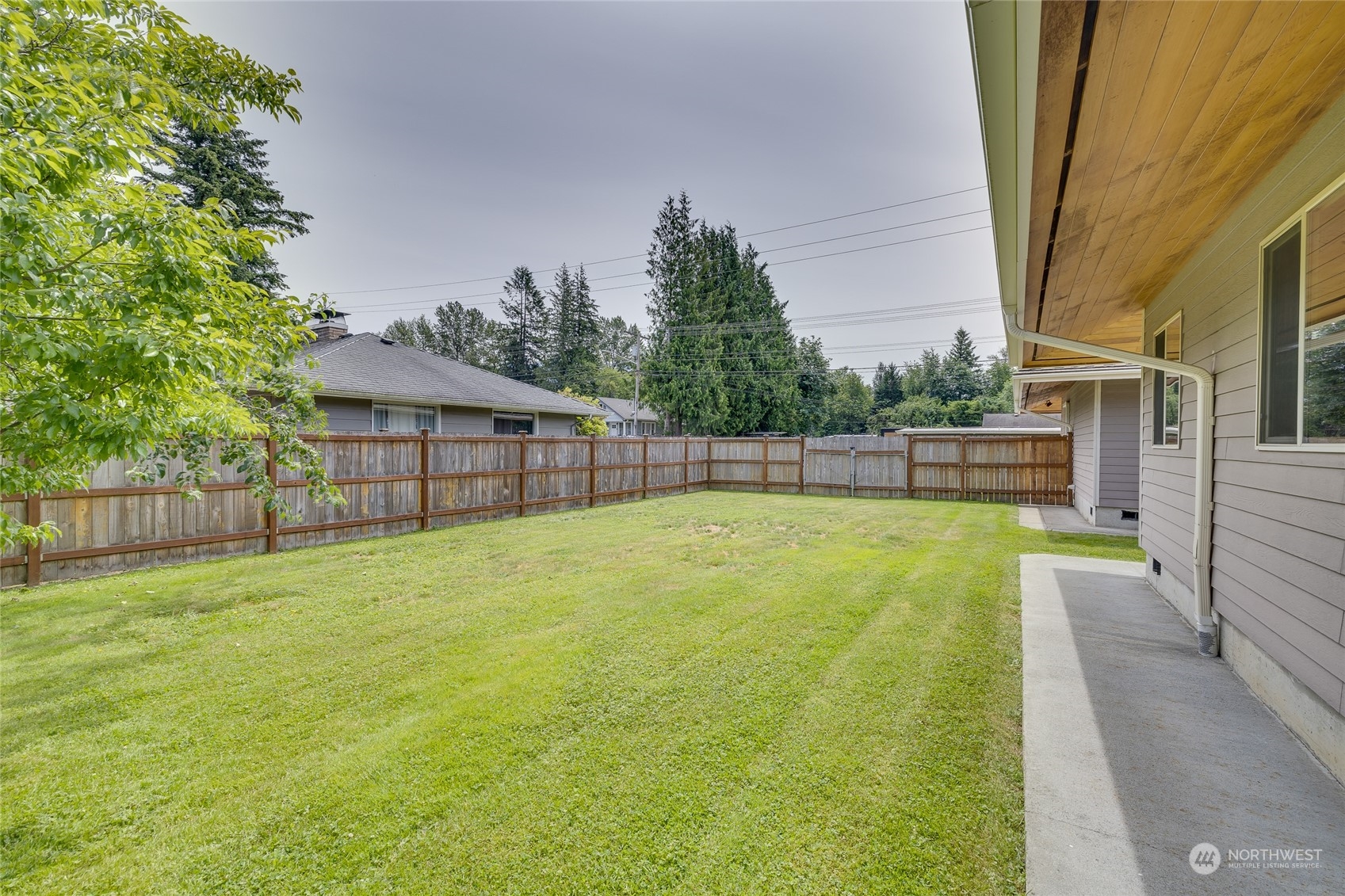 801 Main Street Sultan, WA 98294 - Photo 34 of 40 a view of a backyard with a small cabin