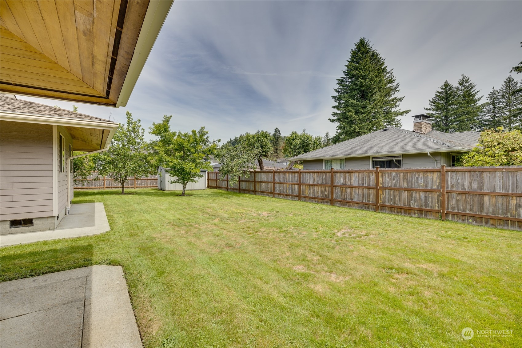 801 Main Street Sultan, WA 98294 - Photo 36 of 40 a backyard of a house with lots of green space
