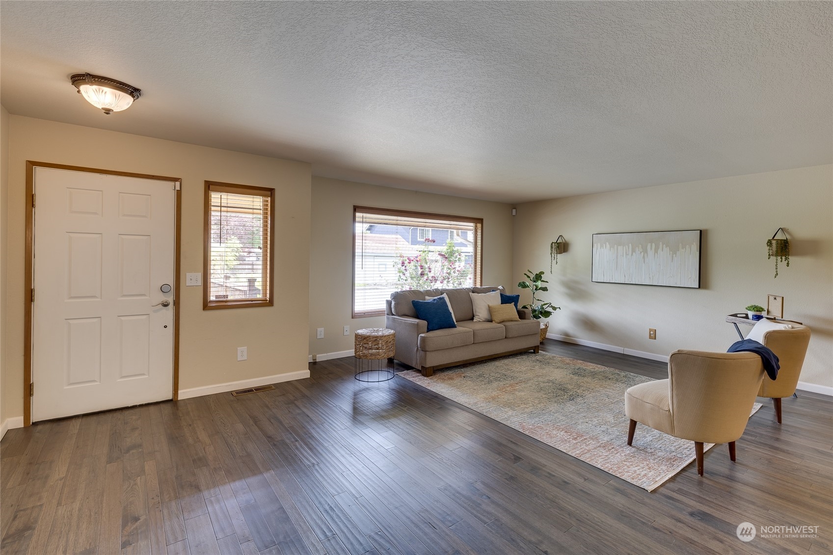 801 Main Street Sultan, WA 98294 - Photo 5 of 40 a living room with furniture and wooden floor