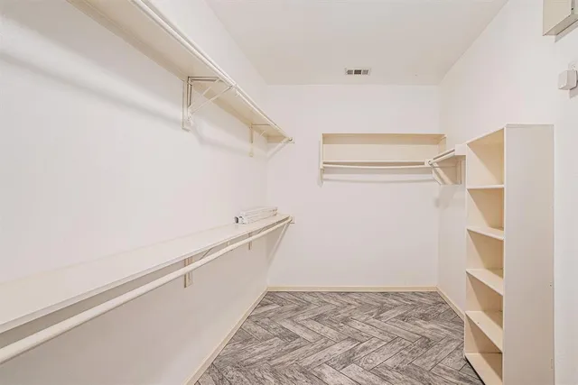 a view of a room with racks on the wall