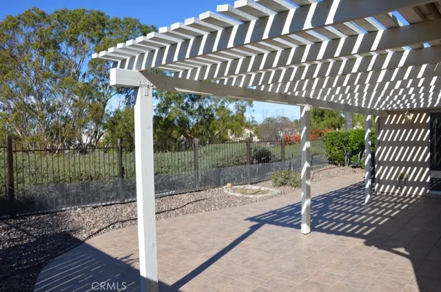 a patio with table and chairs