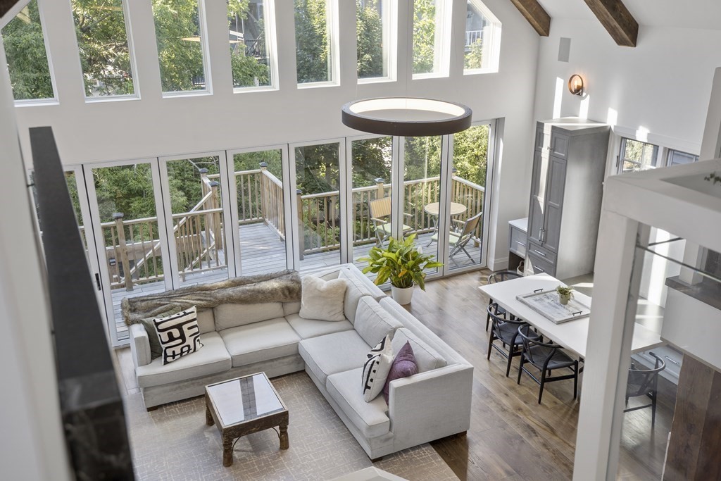 719 East 2nd Street, Unit PH3 Boston, MA 02127 - Photo 15 of 38 a living room with furniture and a large window