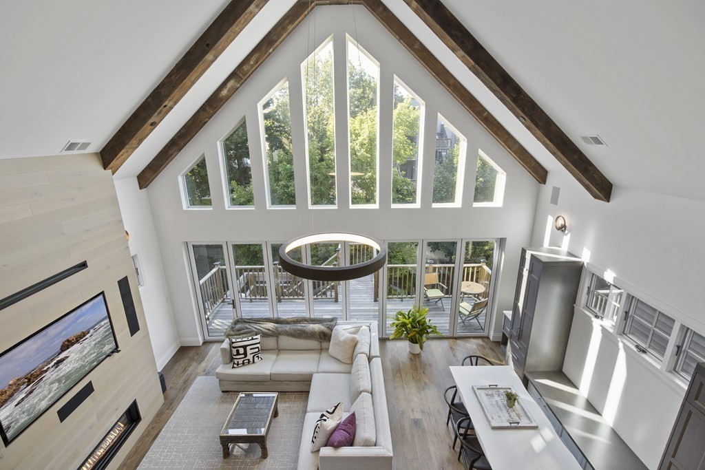 719 East 2nd Street, Unit PH3 Boston, MA 02127 - Photo 16 of 38 a room with furniture and wooden floor