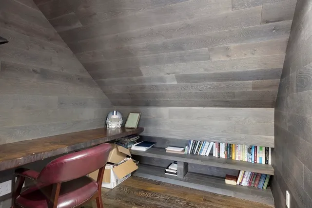 a view of workspace with lounge chair