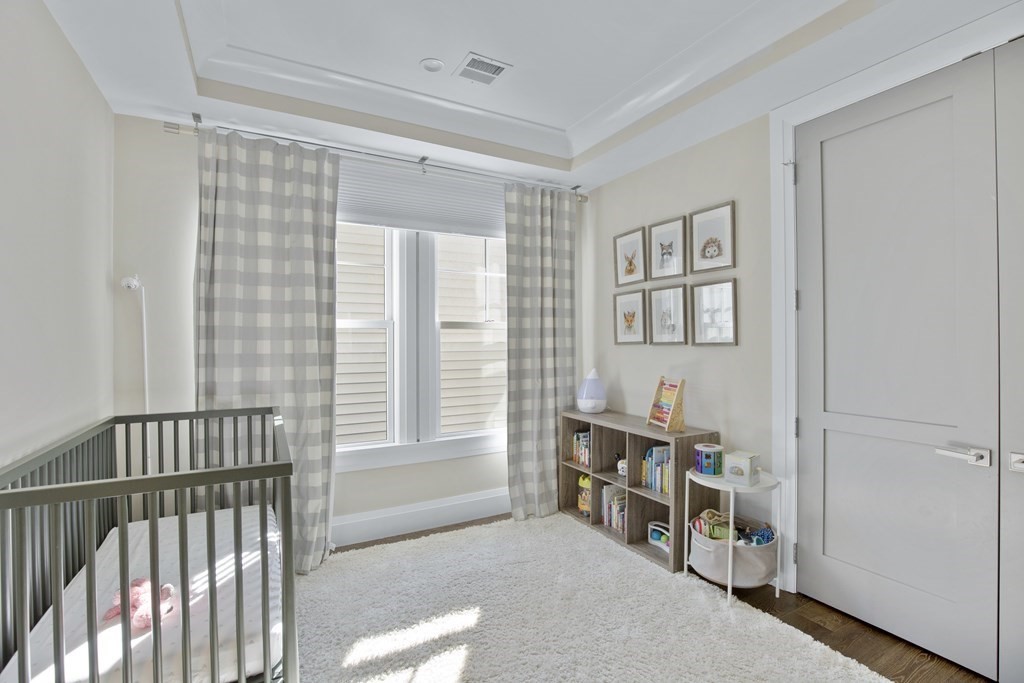 719 East 2nd Street, Unit PH3 Boston, MA 02127 - Photo 26 of 38 a livingroom with furniture and windows