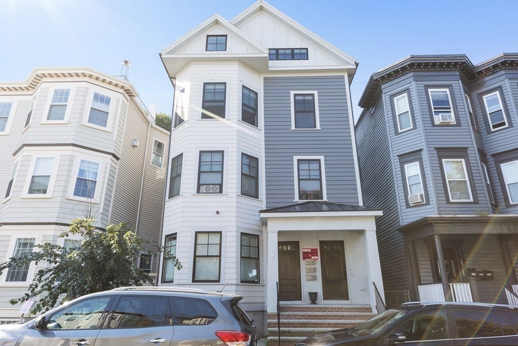 719 East 2nd Street, Unit PH3 Boston, MA 02127 - Photo 34 of 38 a front view of a building with lot of windows