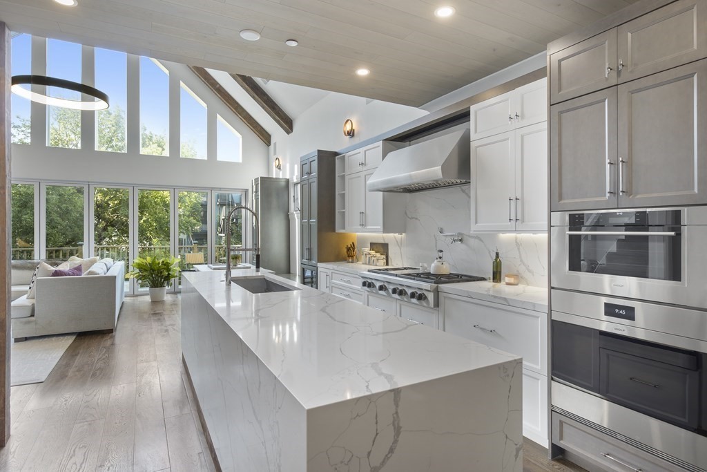 719 East 2nd Street, Unit PH3 Boston, MA 02127 - Photo 6 of 38 a large kitchen with stainless steel appliances and a large window