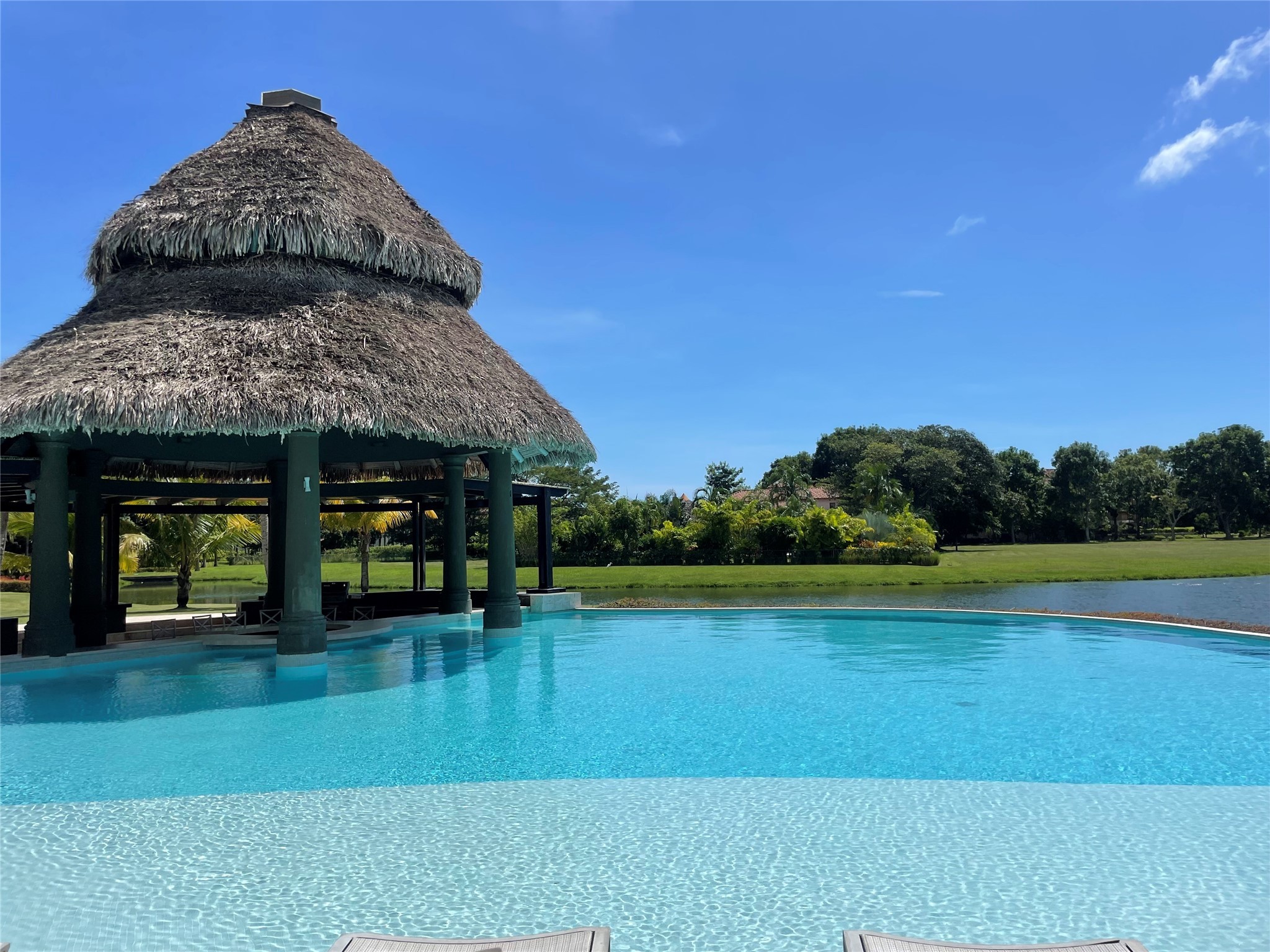 8 Riverside Buenaventura, Unit 8 Riverside, CA 92501 - Photo 11 of 34 a view of a swimming pool with an outdoor space and seating area