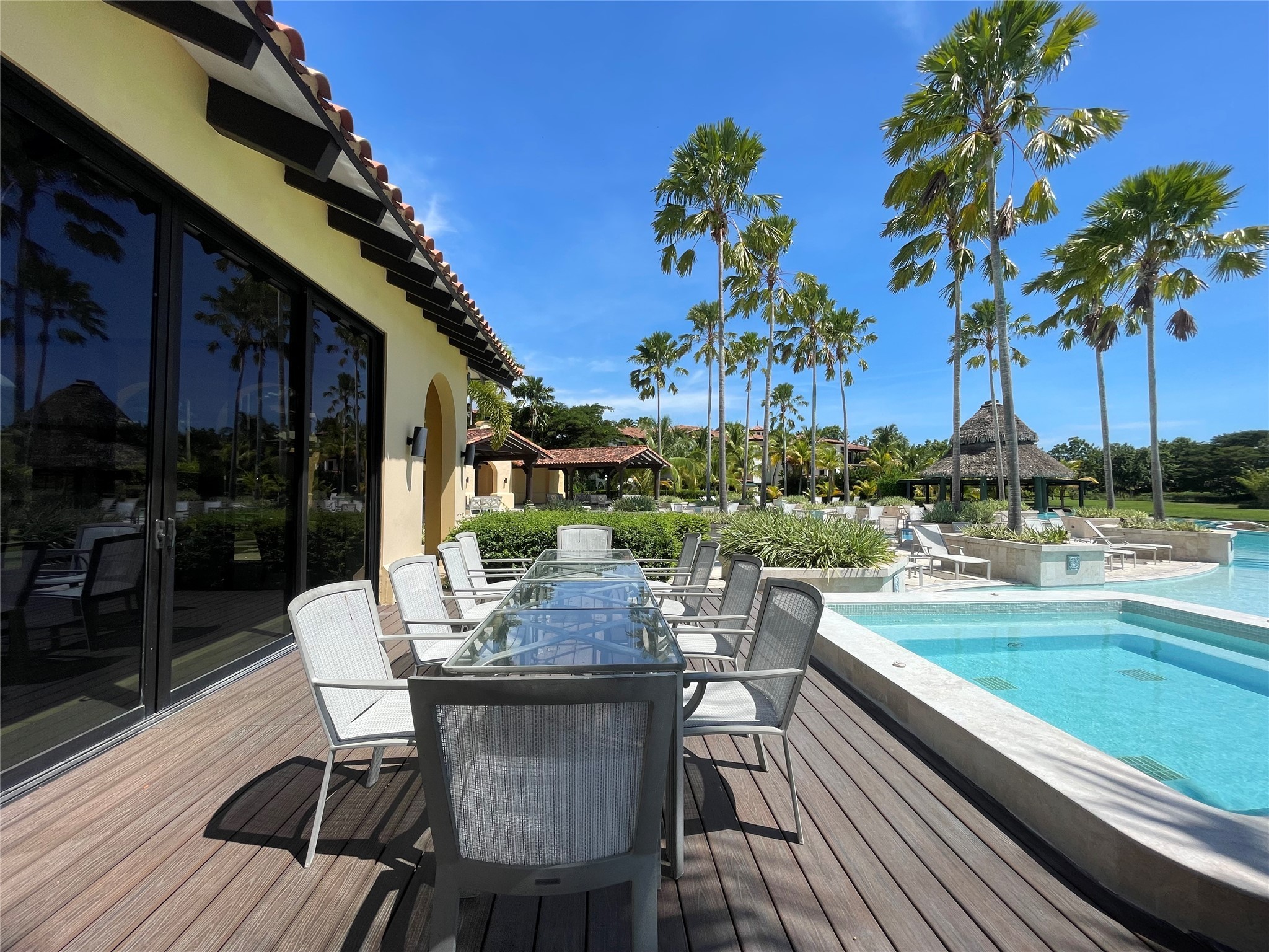 8 Riverside Buenaventura, Unit 8 Riverside, CA 92501 - Photo 16 of 34 a patio with wooden floor table and chairs
