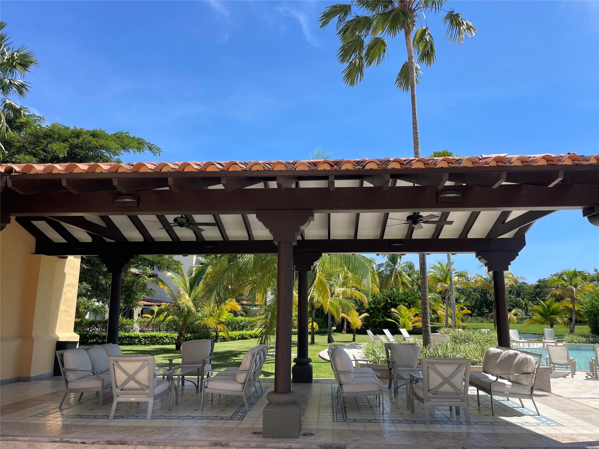 8 Riverside Buenaventura, Unit 8 Riverside, CA 92501 - Photo 20 of 34 a view of a patio with table and chairs potted plants