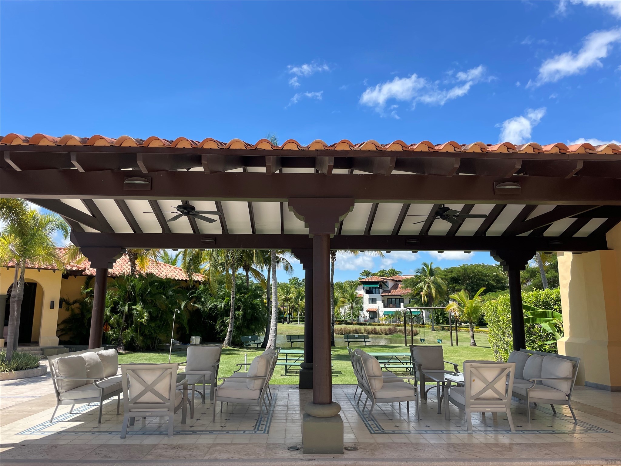 8 Riverside Buenaventura, Unit 8 Riverside, CA 92501 - Photo 21 of 34 a view of a chairs and table in patio with a yard