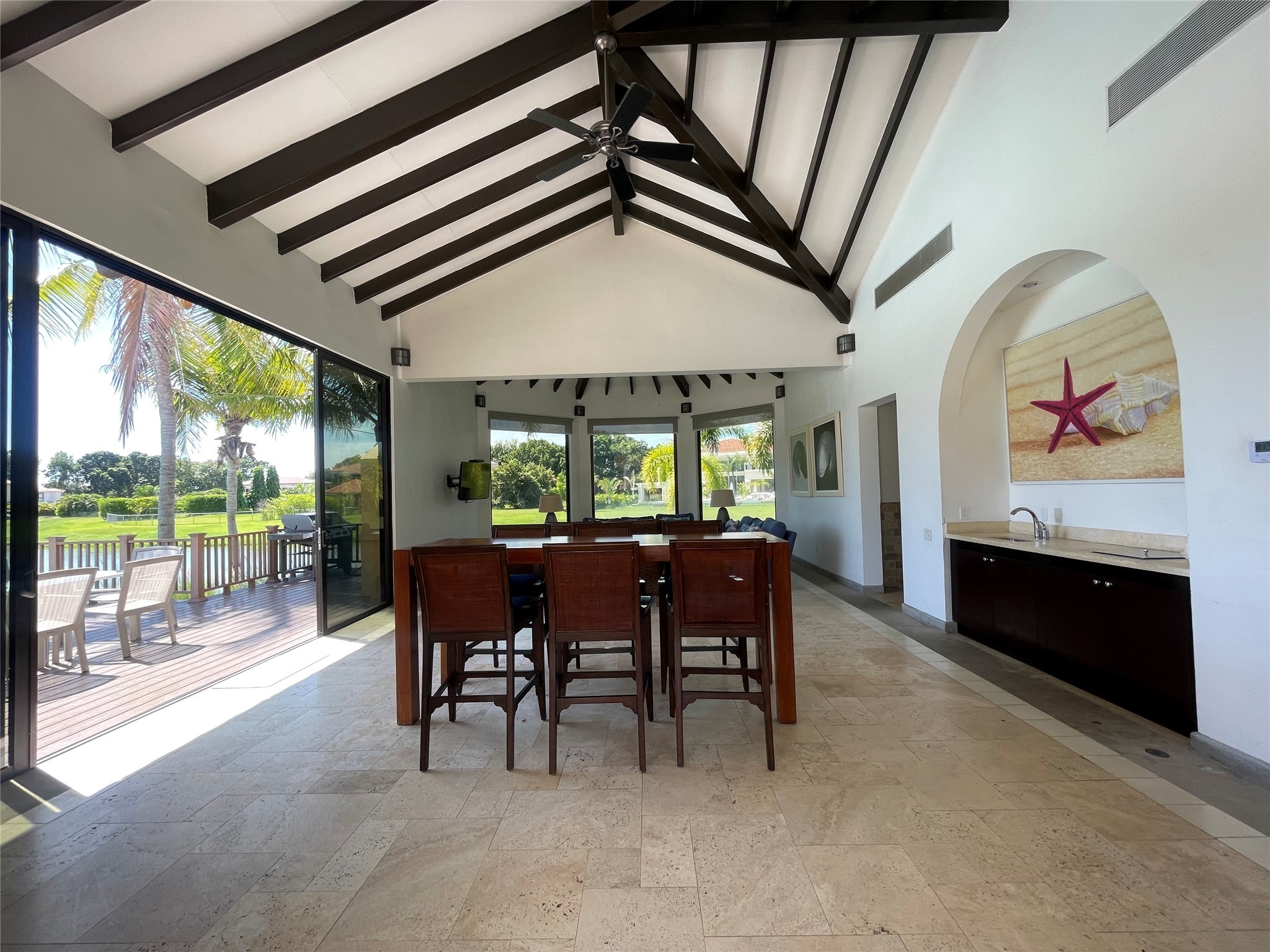 8 Riverside Buenaventura, Unit 8 Riverside, CA 92501 - Photo 27 of 34 a view of a dining room with furniture window and outside view