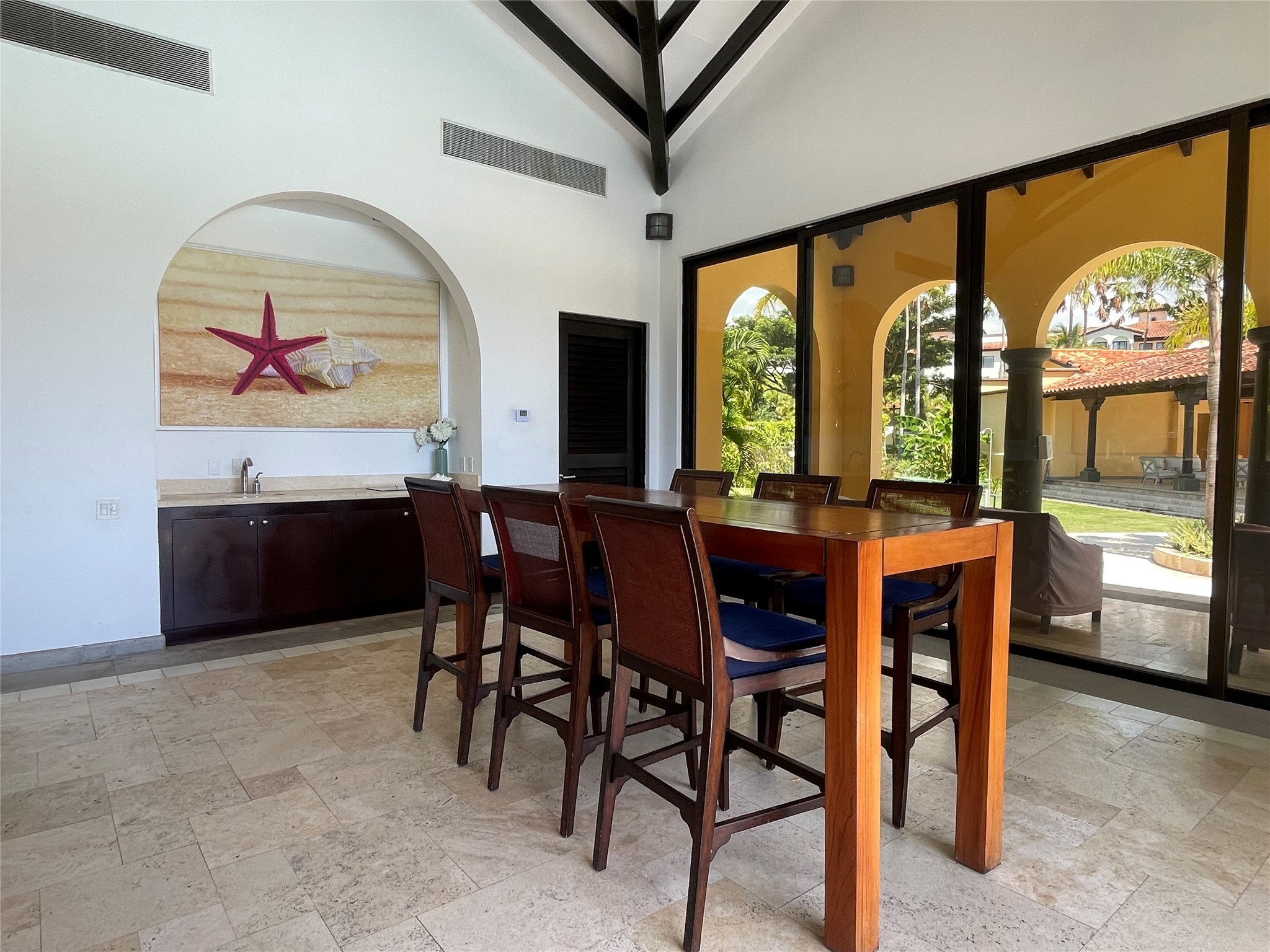 8 Riverside Buenaventura, Unit 8 Riverside, CA 92501 - Photo 30 of 34 a view of a dining room with furniture window and outdoor view
