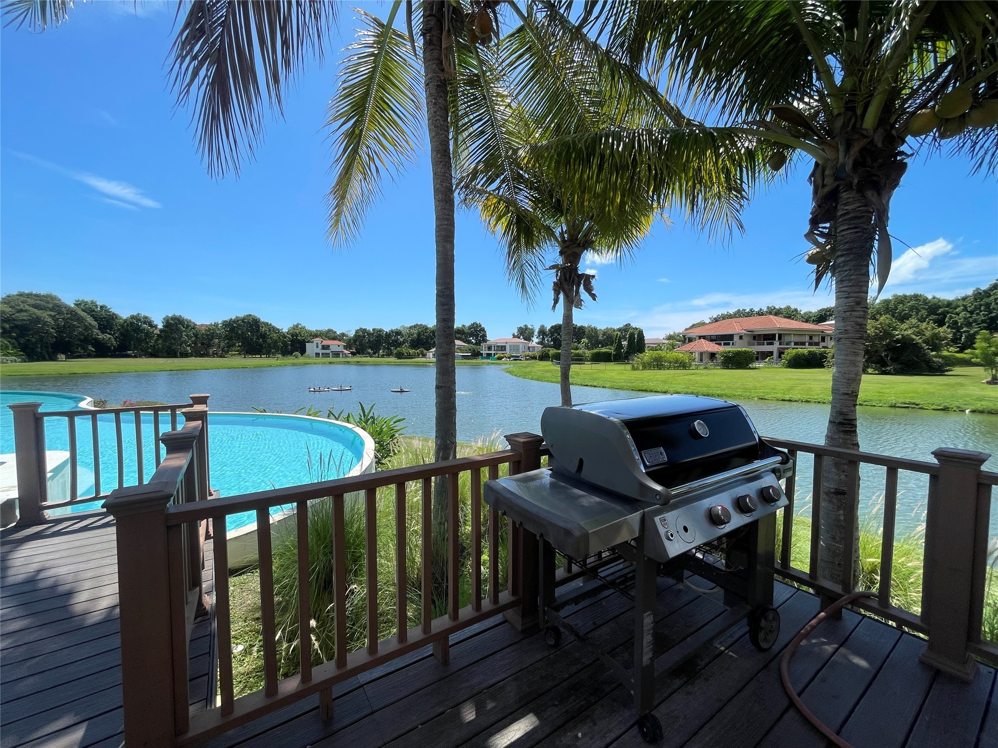 8 Riverside Buenaventura, Unit 8 Riverside, CA 92501 - Photo 31 of 34 a view of a wooden deck with lake view