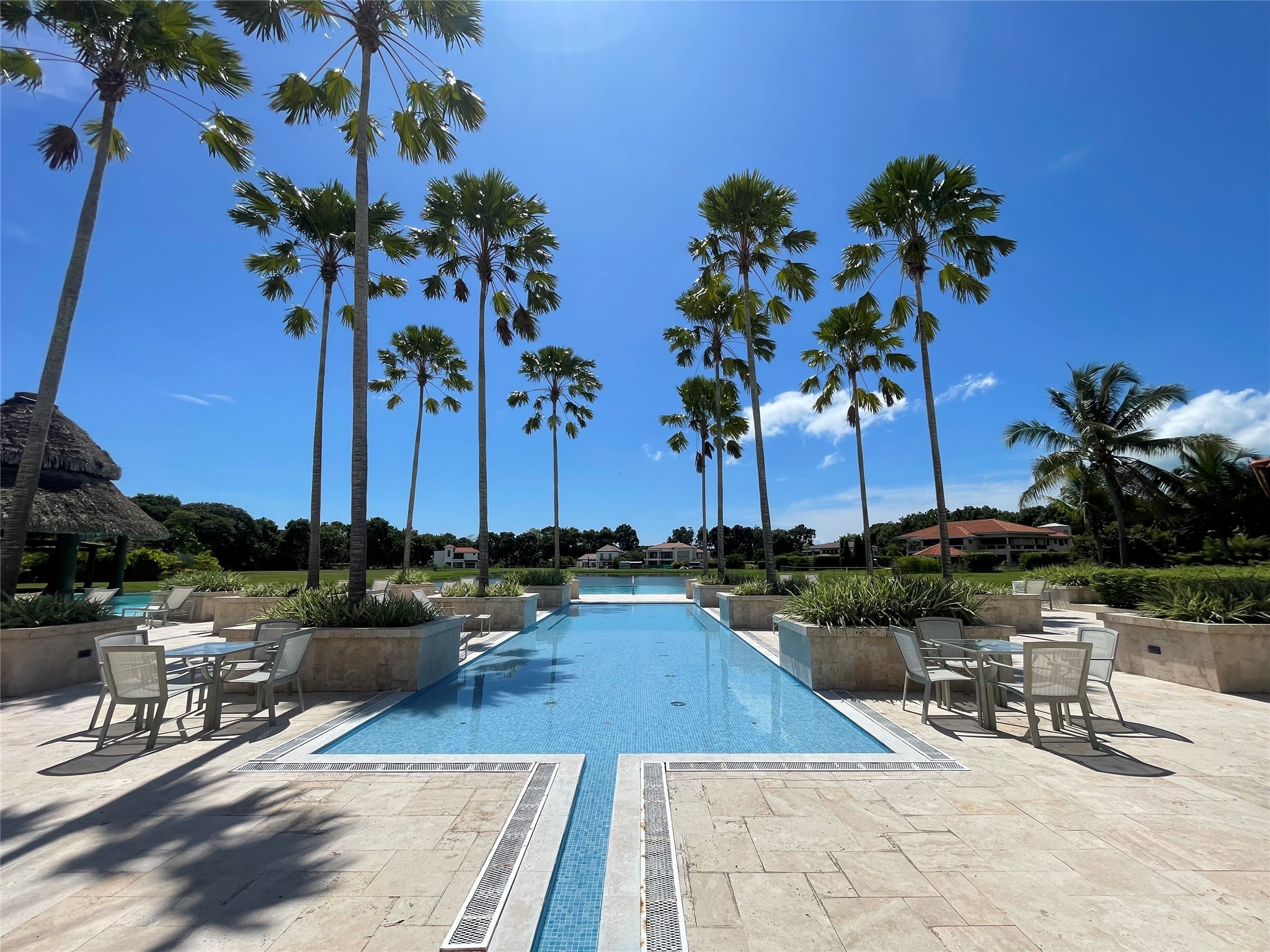8 Riverside Buenaventura, Unit 8 Riverside, CA 92501 - Photo 7 of 34 a view of a lounge chairs and table on the patio