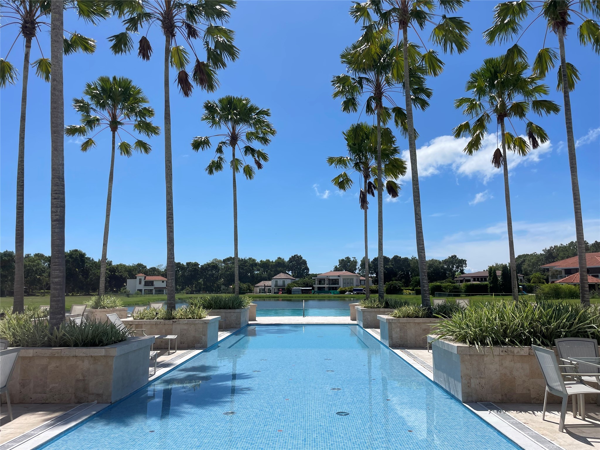 8 Riverside Buenaventura, Unit 8 Riverside, CA 92501 - Photo 8 of 34 a view of a lake with a palm trees