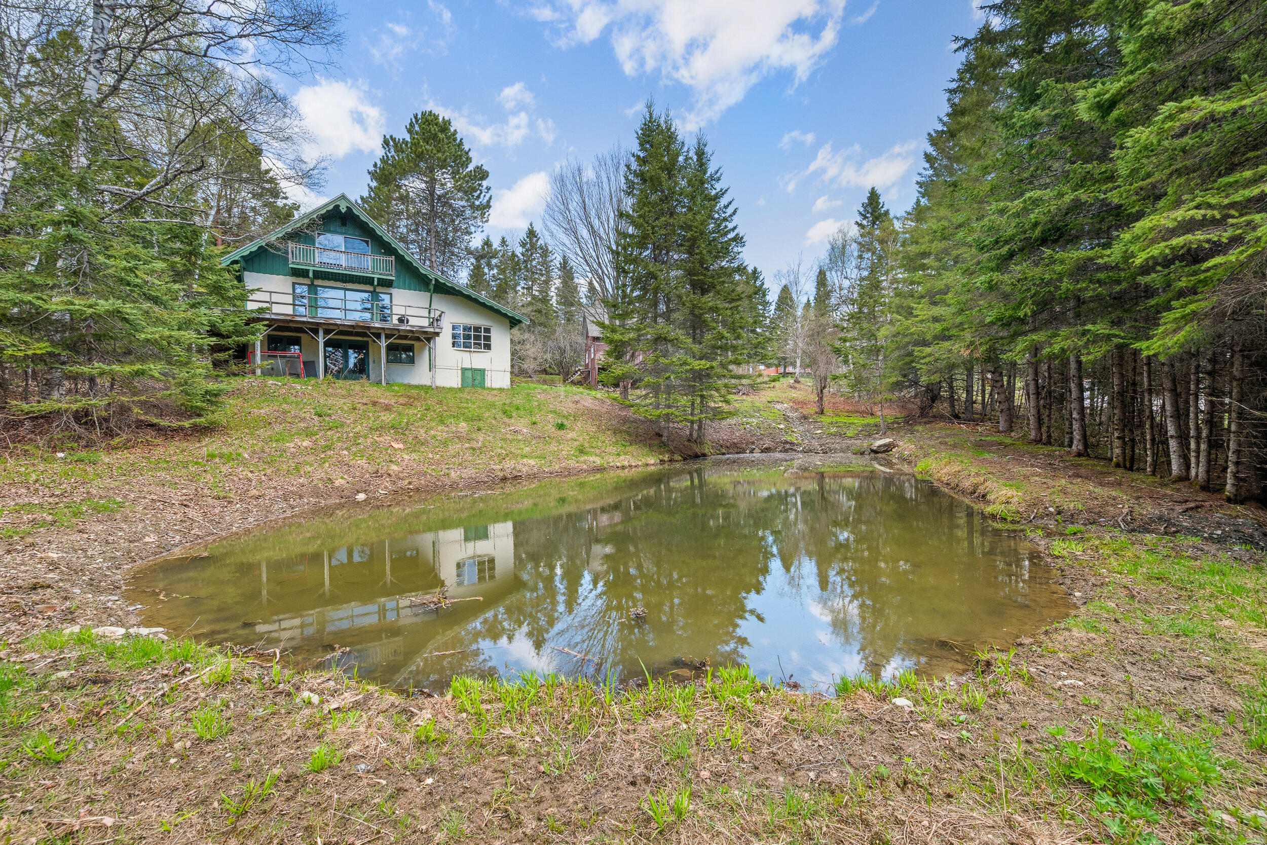 62 Furbish Road Rangeley, ME 04970 - Photo 30 of 31 Pond and Back of House