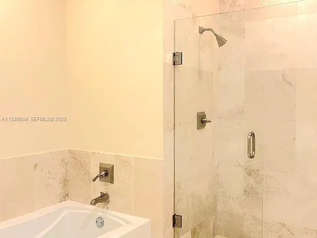 a view of a fountain in front of a building