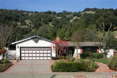 536 Miller Creek Road San Rafael, CA 94903 - Photo 1 of 1 Front view w/aggregate driveway and view of open space. Only one bedroom faces front.