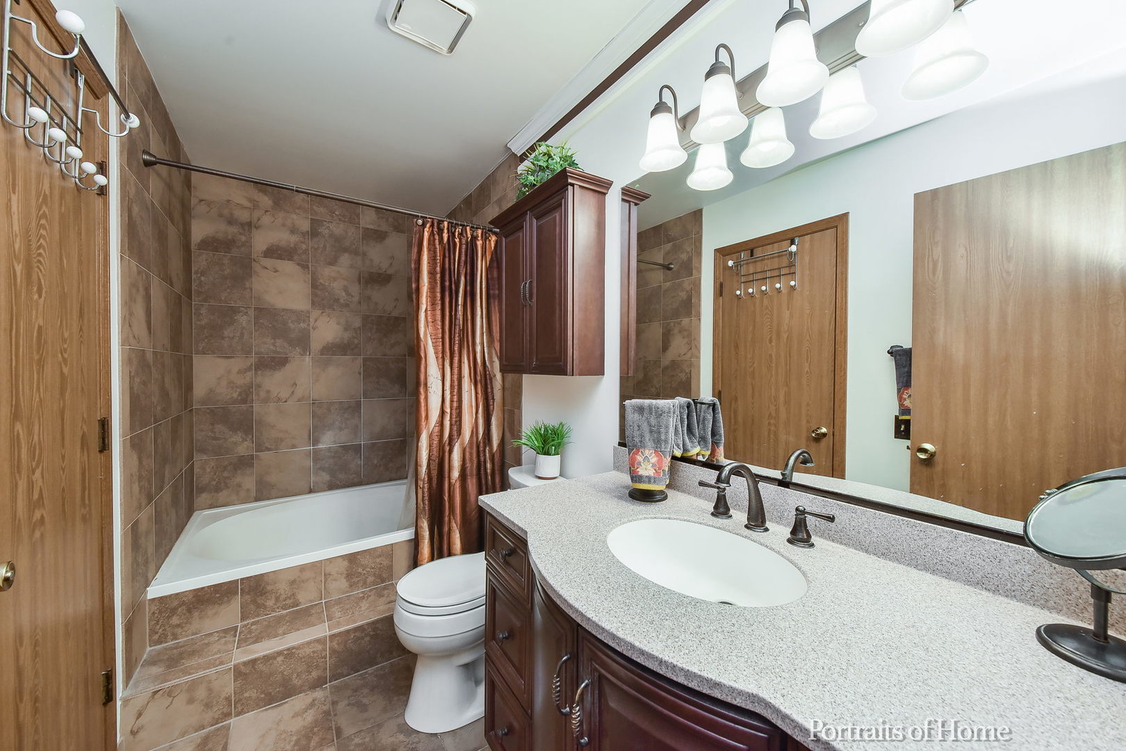 75 St Croix Court Aurora, IL 60504 - Photo 14 of 20 a bathroom with a sink toilet a mirror and shower