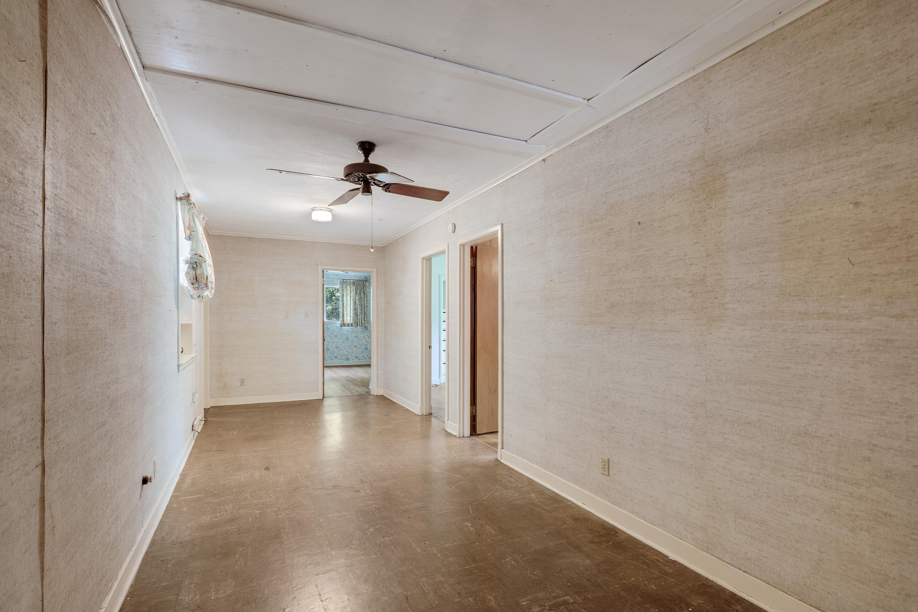 4356 Tuckahoe Road Memphis, TN 38117 - Photo 20 of 25 wooden floor in an empty room with a window
