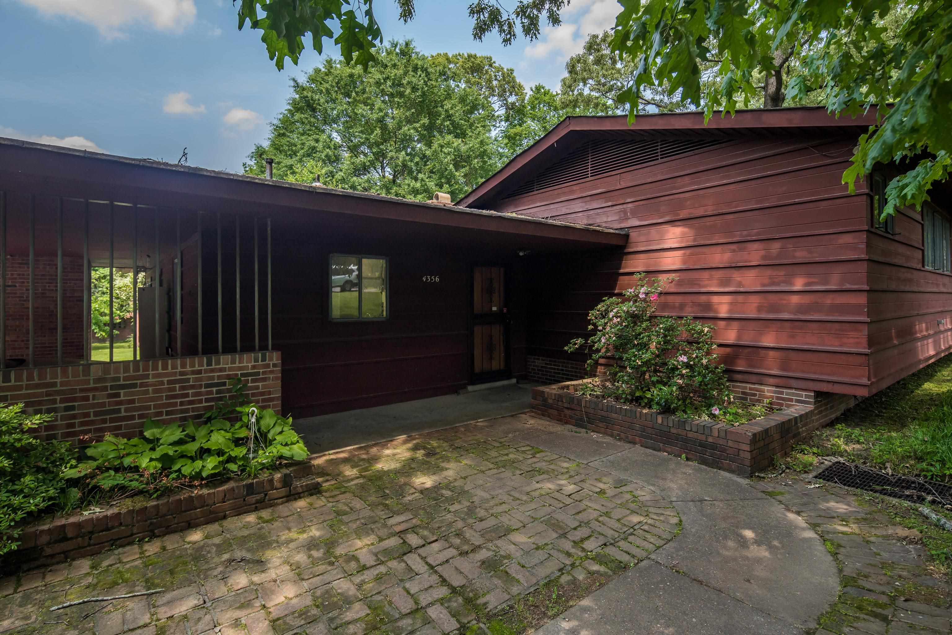 4356 Tuckahoe Road Memphis, TN 38117 - Photo 4 of 25 a view of brick house with potted plants