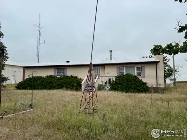 a house view with a garden space