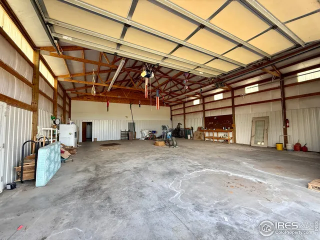 a view of a empty room with storage